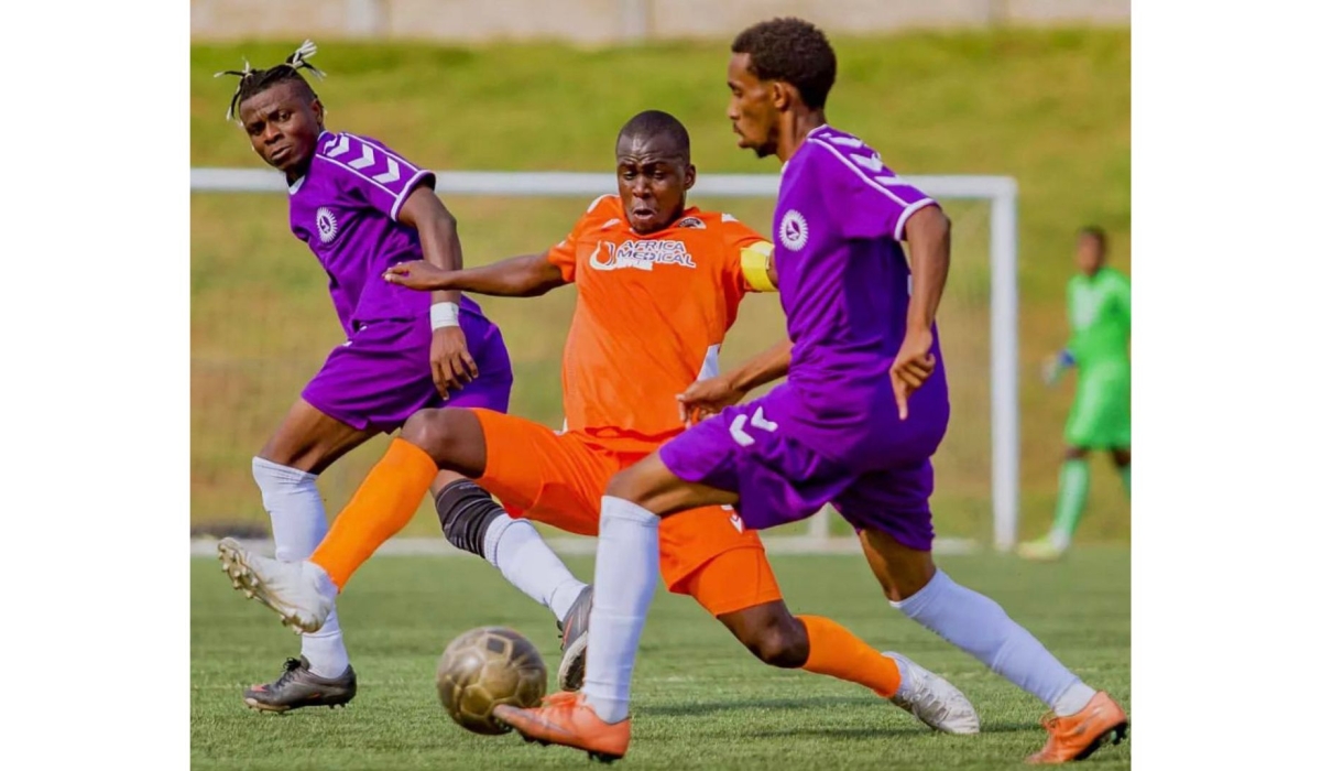 Sunrise FC players and AS Kigali&#039;s Bashiri vie for the ball during a 2-2 draw at  Bugesera Stadium in Nyamata on Thursday. COURTESY
