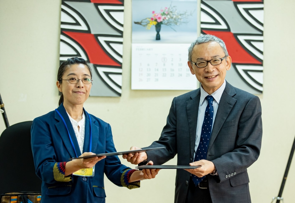 The Ambassador of Japan to Rwanda, Isao Fukishima and Community Road Empowerment (CORE) representative after signing a $324,000 support to the government to revamp rural infrastructure . Courtesy