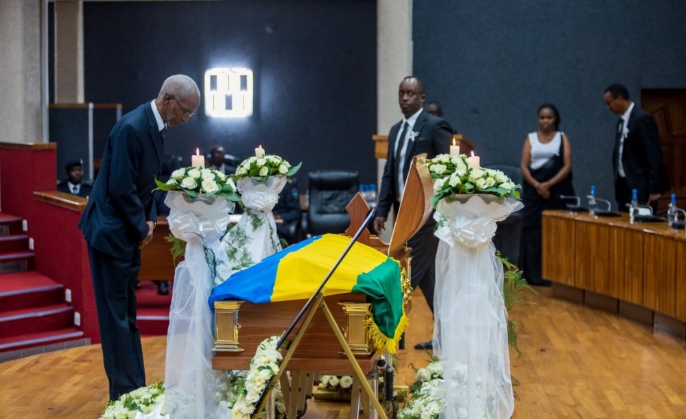 RPF Secretary General François Ngarambe pays tribute to Late Rwigamba during the  lying-in-state ceremony at Parliament, on Sunday, February 19. Courtesy