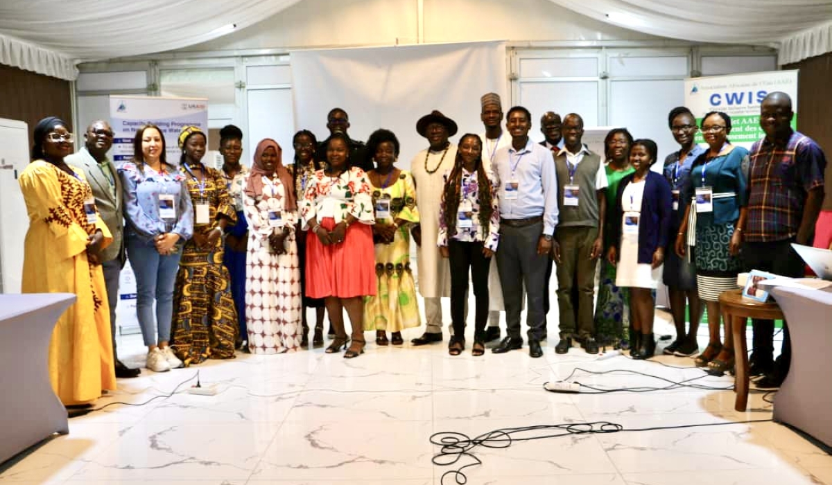 Journalists that attended the training on water and sanitation posing for a group photo with some of AFWA heads.