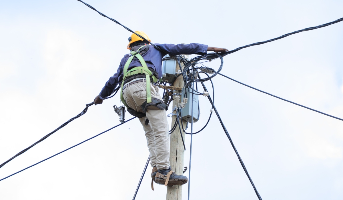 A technician during the electricity supply activities  in Gicumbi District. File