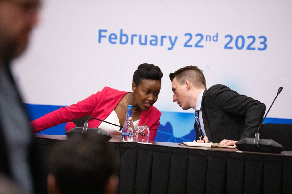 Minister of ICT and Innovation Paula Ingabire consults with Ryan Goodnight, the Director, Global Licensing and Market Activation at SpaceX during the official launch of Starlink&#039;s services in Kigali on February 22. Dan Gatsinzi