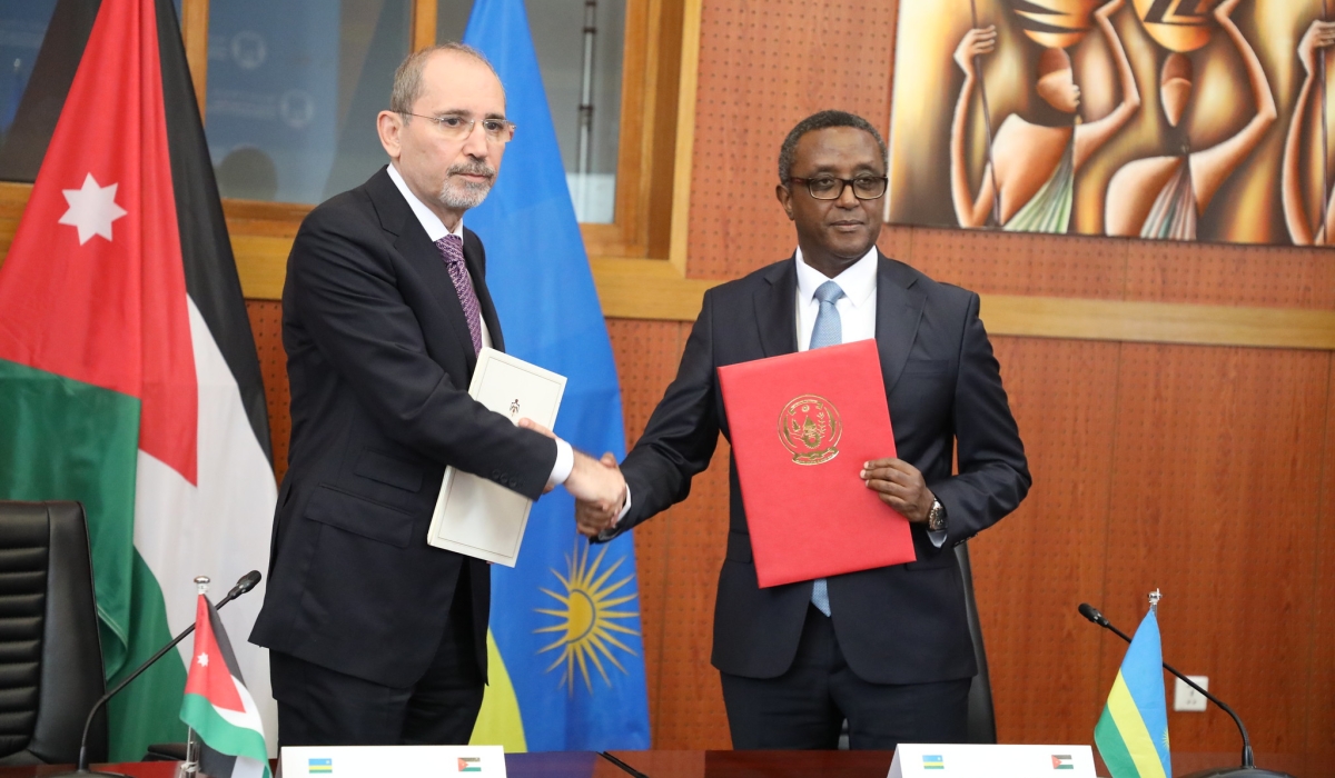 Minister of Foreign Affairs, Dr.Vincent Biruta and Ayman Safadi, the Deputy Prime Minister and Minister of Foreign Affairs and Expatriates of the Kingdom of Jordan after signing the MoU in Kigali, on February 22. All photos by Craish Bahizi