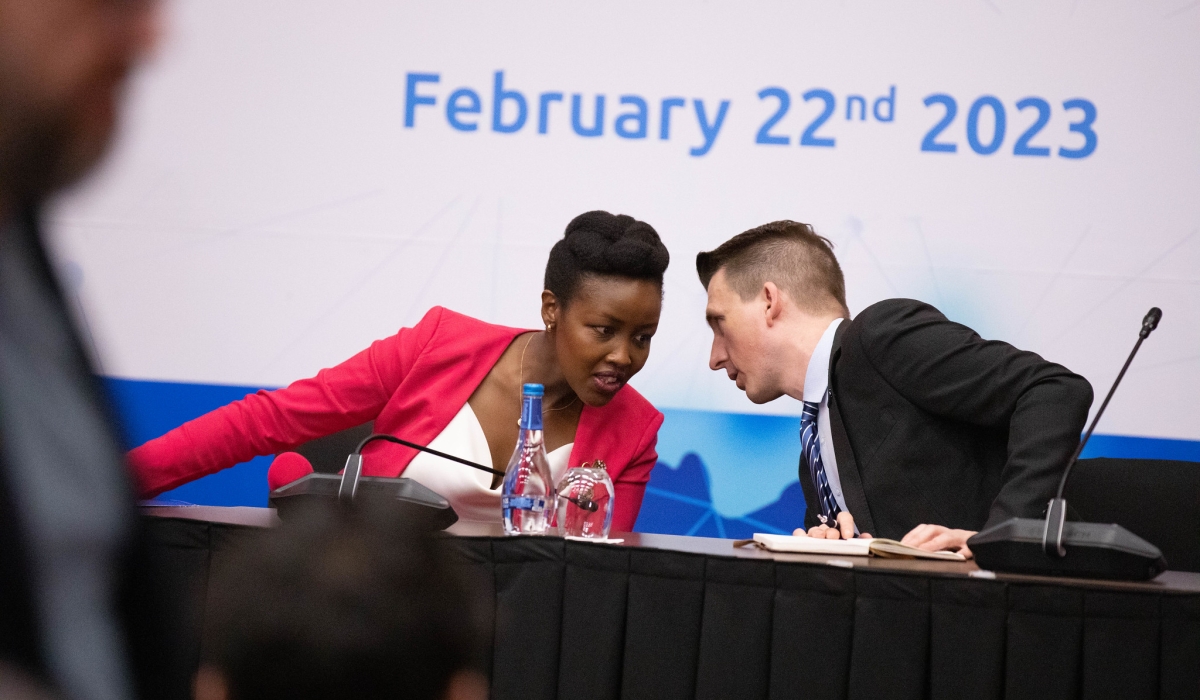 Minister of ICT and Innovation Paula Ingabire consults with Ryan Goodnight, the Director, Global Licensing and Market Activation at SpaceX during the official launch of Starlink&#039;s services in Kigali on February 22. Dan Gatsinzi