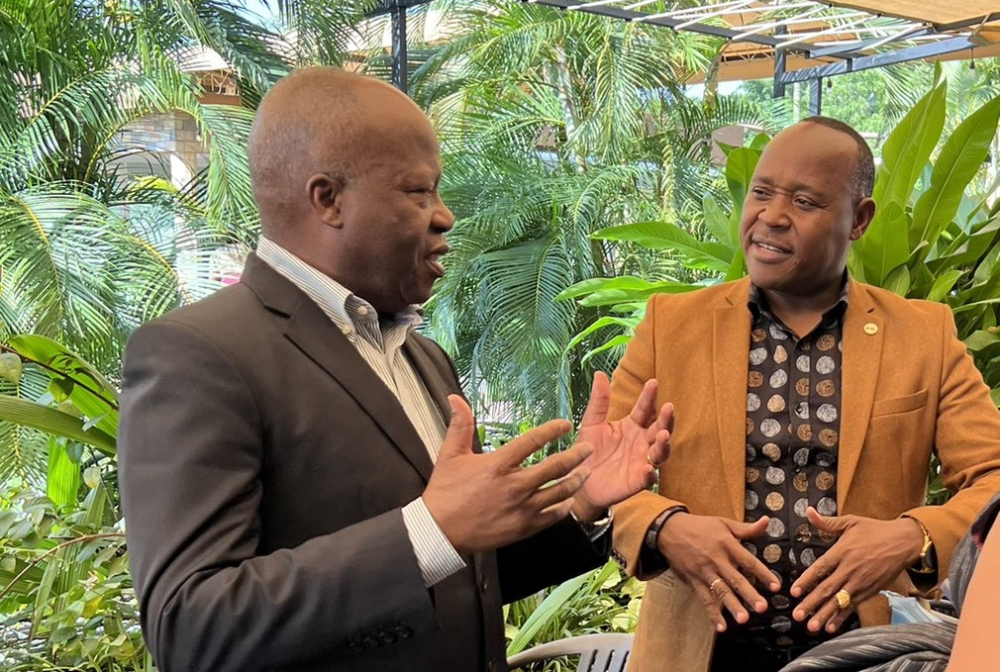 The East African Community Secretary General, Peter Mathuki (R) meets with the Executive Secretary of the International Conference on the Great Lakes Region, Amb. João Caholo , on Wednesday, February 22. Courtesy