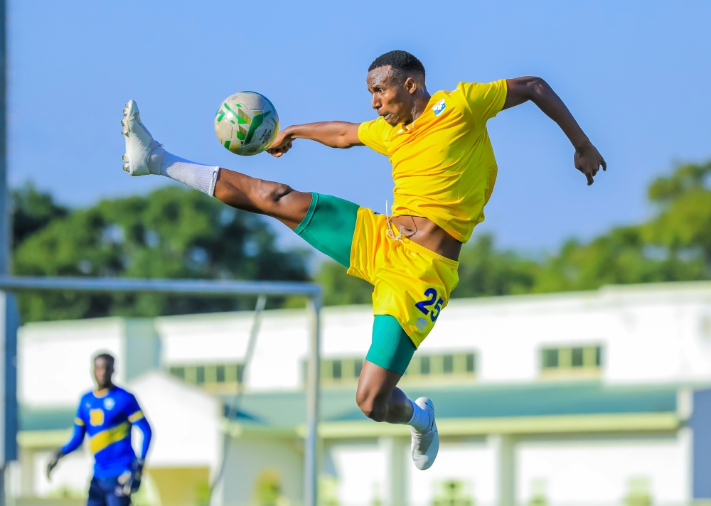 National football team defender  Emery Bayisenge in action during Amavubi training session. Bayisenge is set to join Kenya based team Gor Mahia