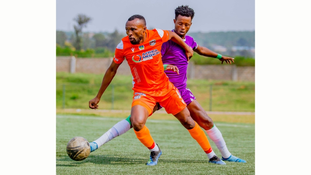 AS Kigali&#039;s Jacques Tuyisenge controls the ball against Sunrise&#039;s defender. City of Kigali sponsored team will face Etincelles FC on Friday, February 24, Umuganda Stadium