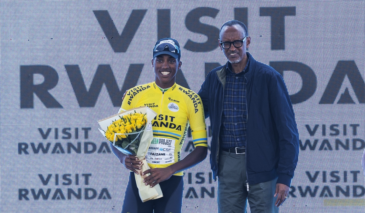 President Paul Kagame poses for a photo with Henok Mulueberhan, the winner of Tour du Rwanda 2023 during the awarding ceremony at Rebero on Sunday, February 26. Village Urugwiro