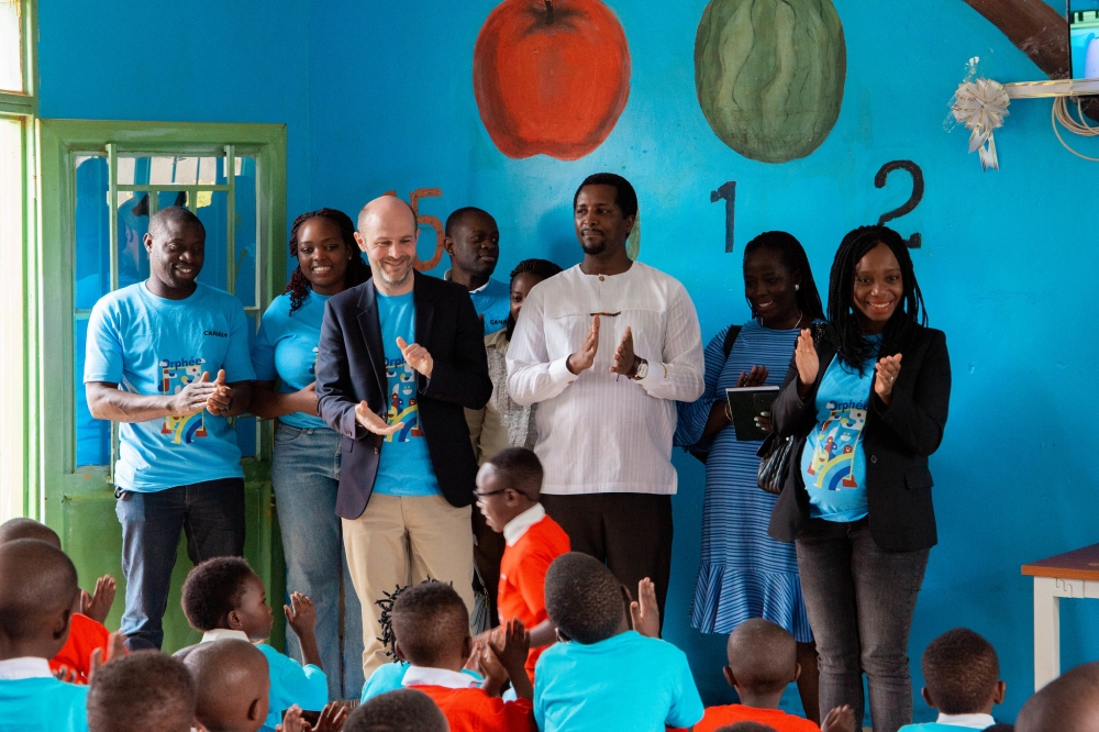 Canal Plus officials during the handover of the support to vulnerable children in an Early Children Development centre in Kigarama sector, Kicukiro District. All PhotoS Craish Bahizi