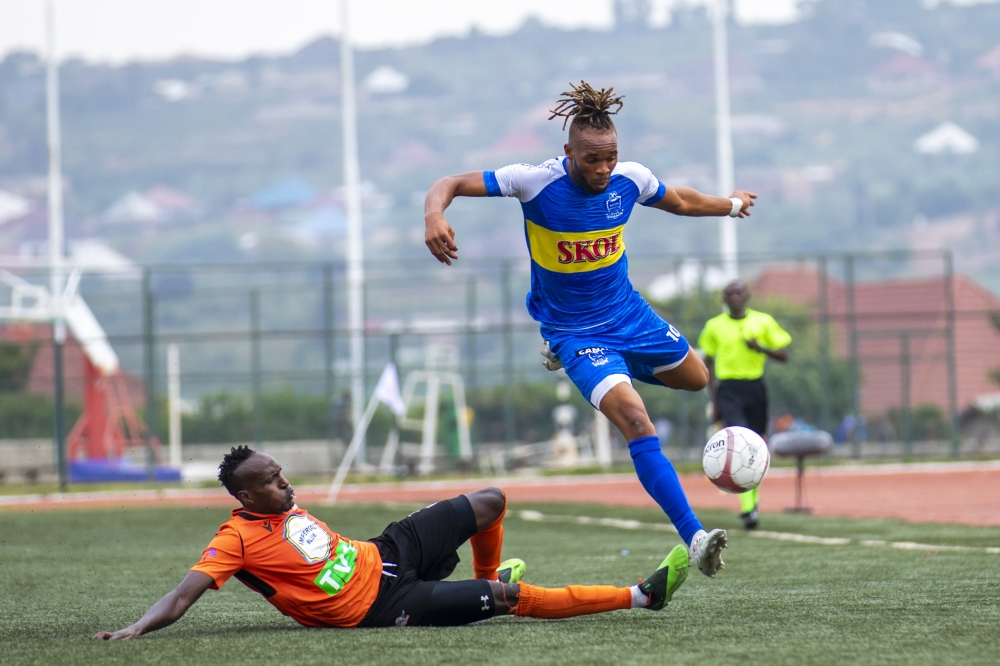 Cameroonian forward Leandre Willy Onana Essomba dribbles past Gasogi United defender Mackenzie Nizigiyimana as he scored a brace for Rayon Sports in a 2-1 win over Gasogi. Olivier Mugwiza