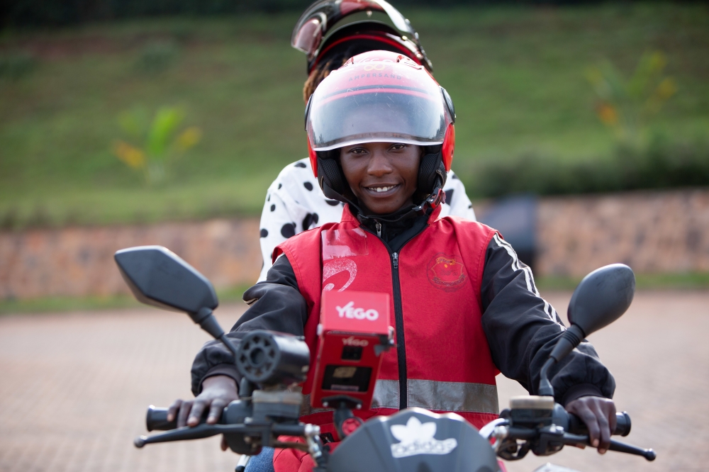Marie Josee Nsanzingoma, a taxi-moto operator on duty in Kigali. She is one of the few women in the profession. Photo by Coucou Zayadah