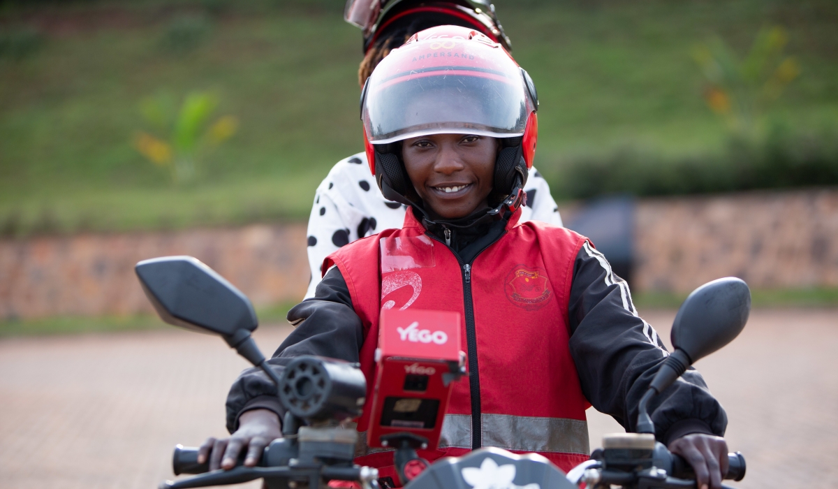Marie Josee Nsanzingoma, a taxi-moto operator on duty in Kigali. She is one of the few women in the profession. Photo by Coucou Zayadah