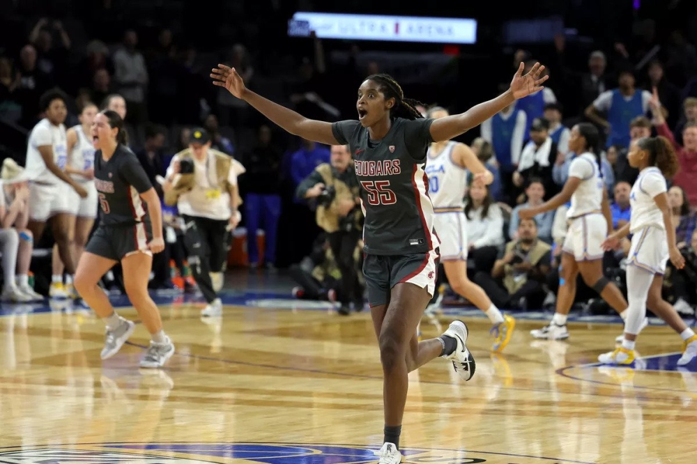 US-based Rwandan basketball player Bella Murekatete celebrates as she helped her team Washington State Cougars to win the Pac-12 Conference women’s trophy, on Sunday, March 5.
