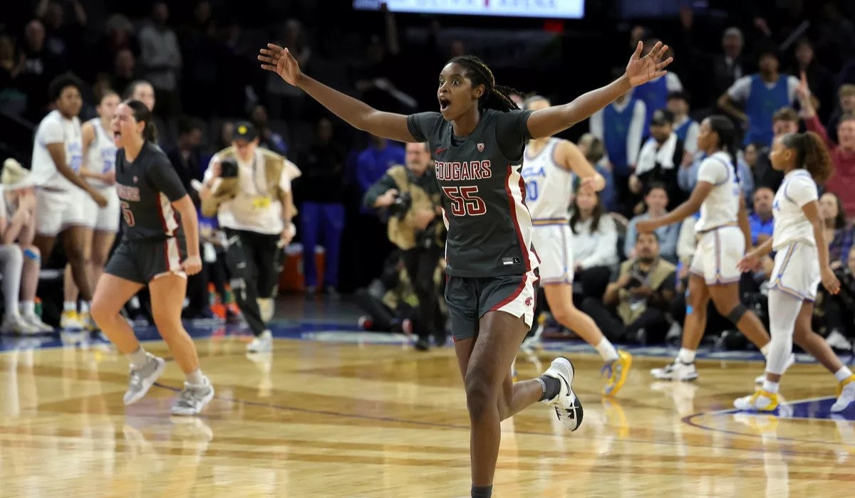 US-based Rwandan basketball player Bella Murekatete celebrates as she helped her team Washington State Cougars to win the Pac-12 Conference women’s trophy, on Sunday, March 5.