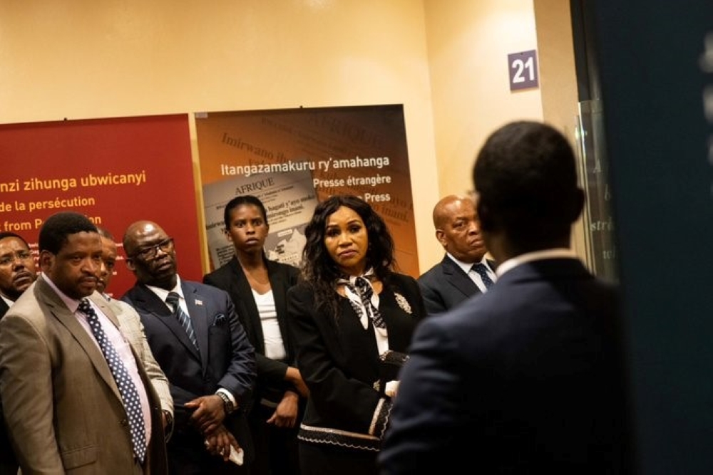 The visiting delegation listens attentively during a lecture on the history of the 1994 genocide against the Tutsi.