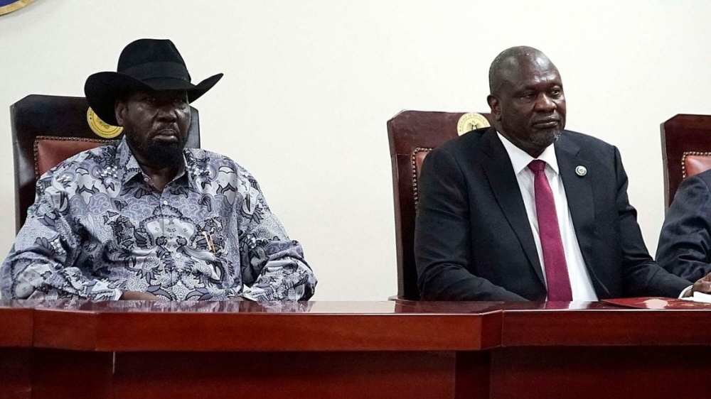 South Sudan President Salva Kiir with opposition leader and First Vice President Riek Machar. The two held talks on March 10, 2023 which were said held to be "frank deliberations". Photo by  AFP