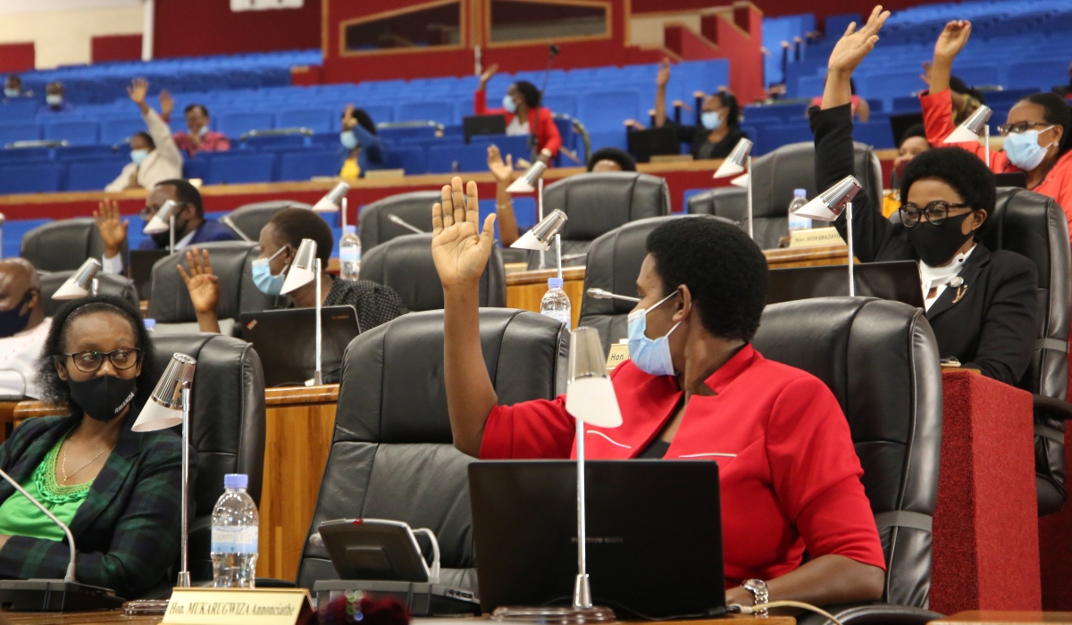 Members of Parliament during a plenary session in 2022. In Rwanda, the fact that the legislation gave equal land rights to women and men, the parliament voted many laws in line with the protection of women’s rights after the Genocide against the Tutsi. Photo by Craish Bahizi.