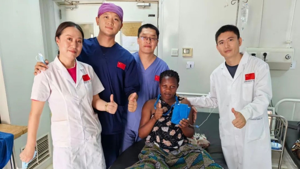Chinese medics after conducting the first painless delivery for a local at  Masaka Hospital in Kigali On March 8. Courtesy