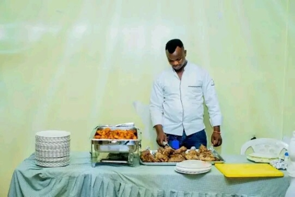 Niyonshuti sets a table for catering. Courtesy photos