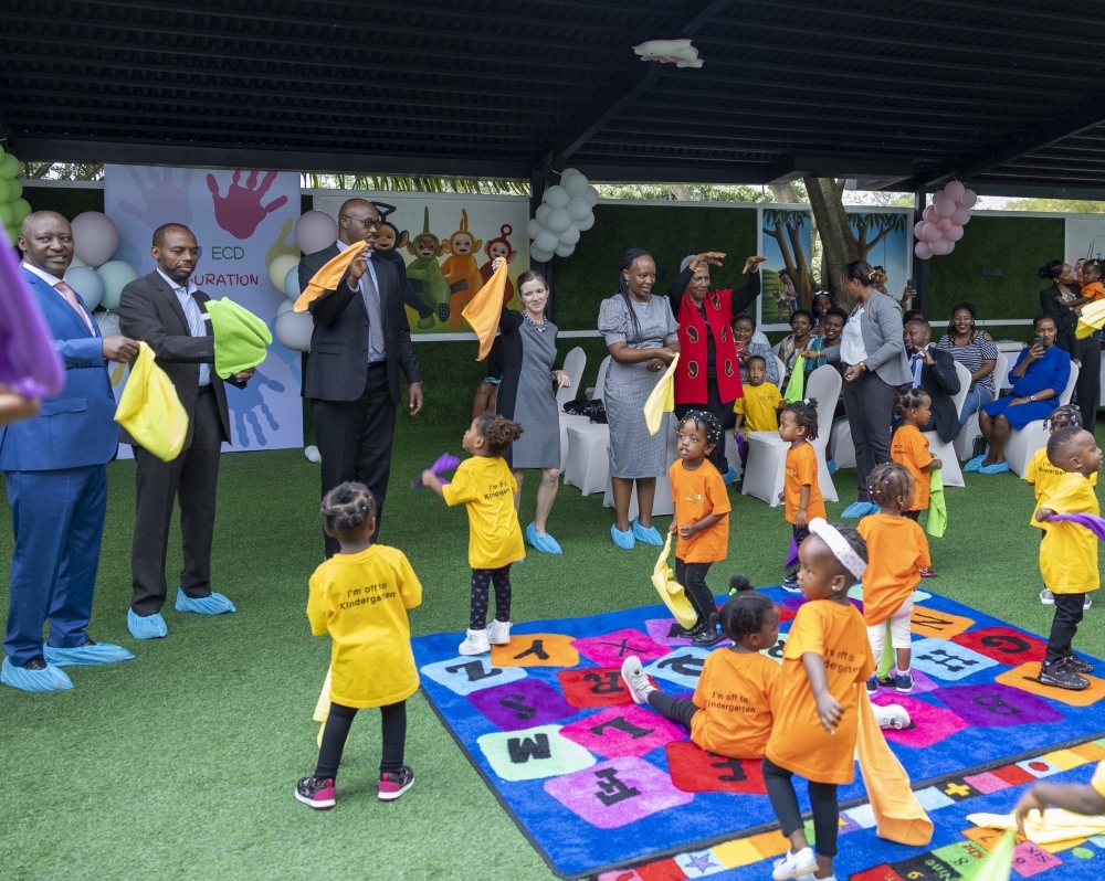 Parents play with their children during the official inauguration of  EZA-Urugwiro ECD Centre on Thursday, September 1, 2022. Courtesy