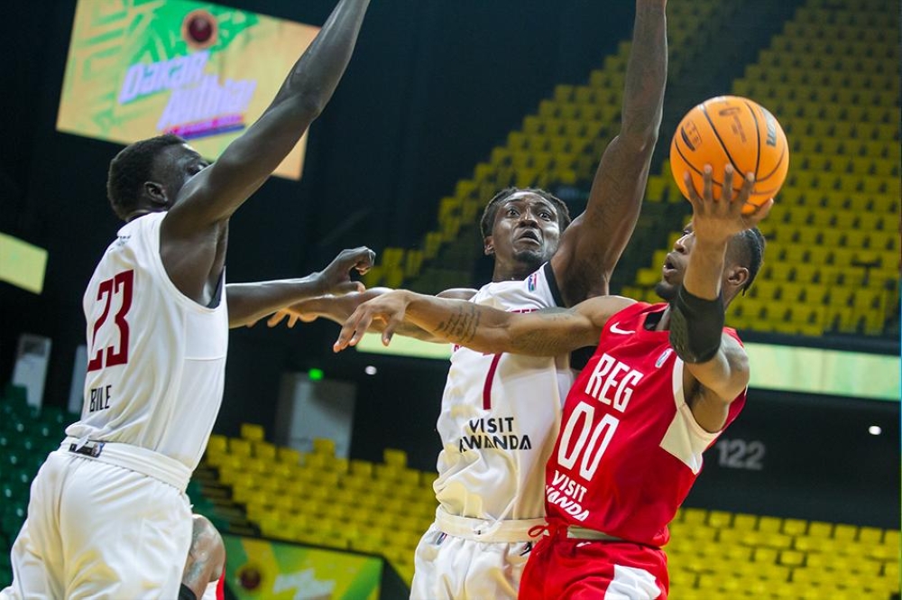 REG&#039;s American point guard Adonis Filer tries a stylish finish as  REG stun  the Ivorian club ABC Fighters  80-73 on Tuesday, in Dakar. The Star Adonis starred with a game high 25 points to power REG to win the game  at the ongoing BAL 2023 Sahara conference regular season in Dakar Arena.