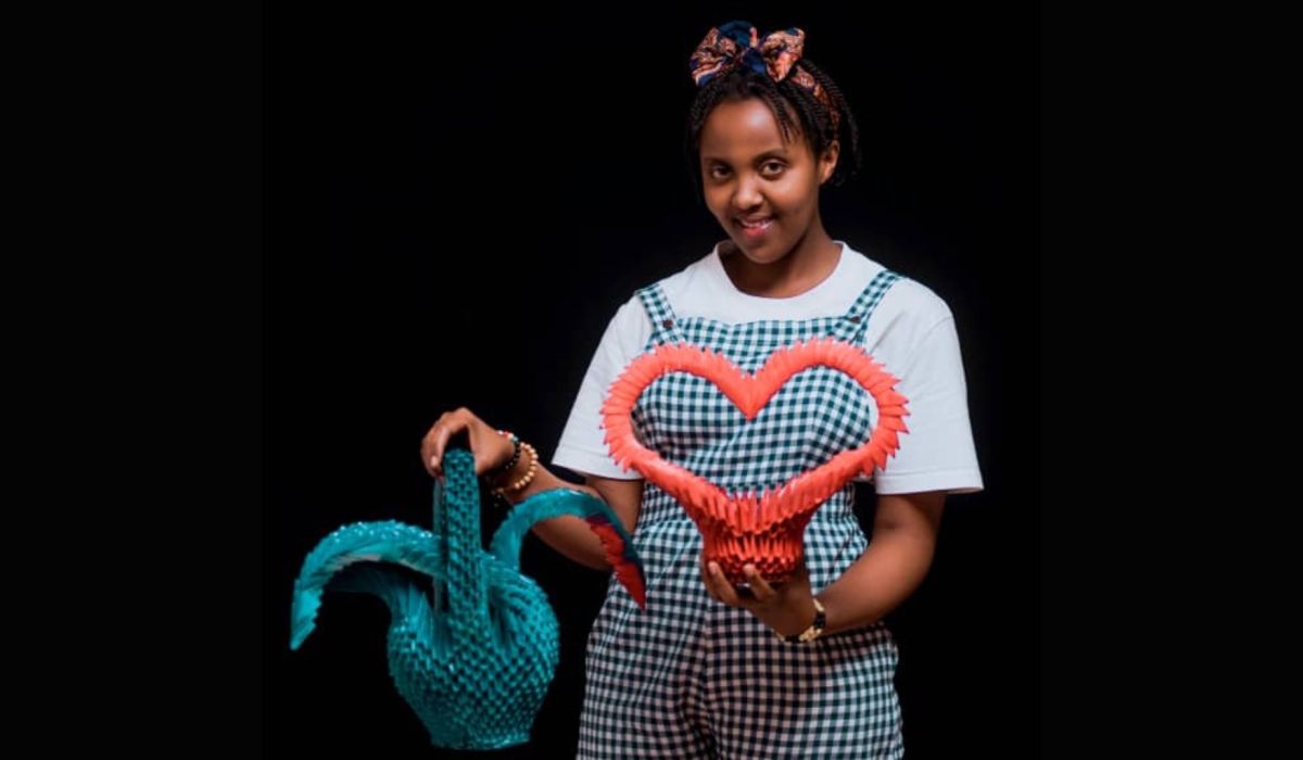 Mediatrice Uwamahoro with some of her artworks made from recycled papers. Courtesy photos
