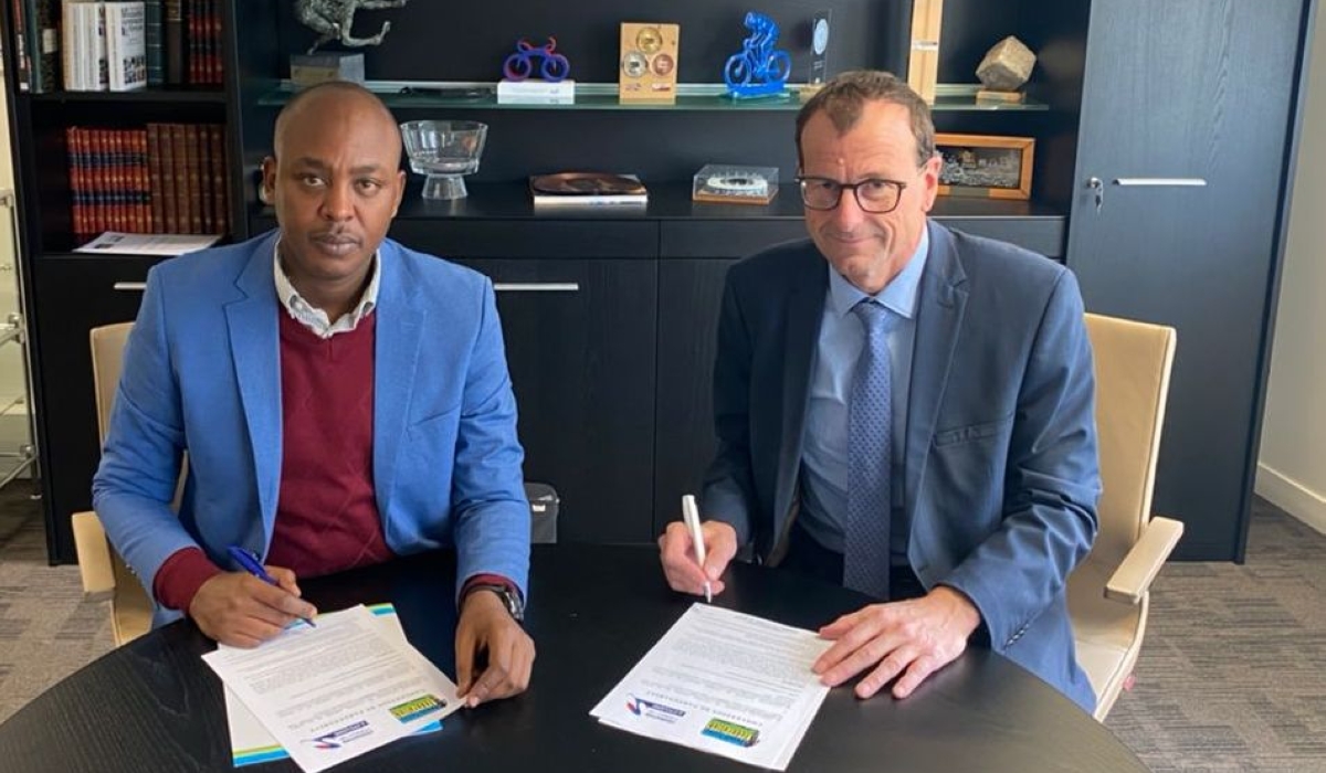 Rwanda cycling federation president, Abdallah Murenzi, and his French counterpart, Michel Callot during the signing ceremony. Courtesy