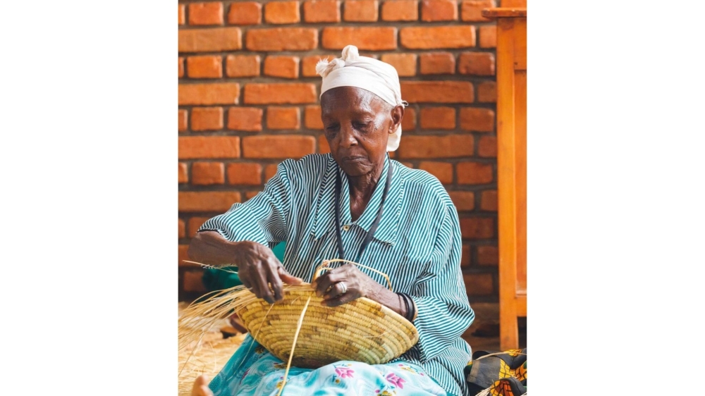 One of women who use a technique of hand scraping and pulp out of vertical strips from the banana pseudo stem  to manufacture banana fiber products. Courtesy