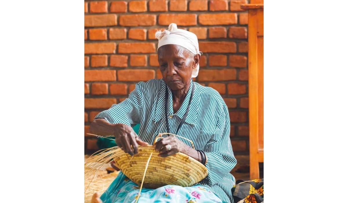One of women who use a technique of hand scraping and pulp out of vertical strips from the banana pseudo stem  to manufacture banana fiber products. Courtesy