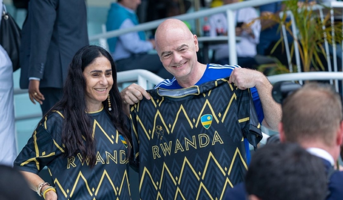 FIFA President Gianni Infantino and his wife Leena show off the Ijezi at the just concluded 73rd FIFA Congress in Kigali. Courtesy.
