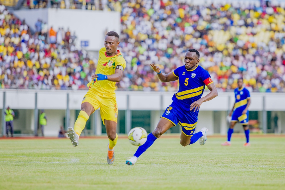 Team captain Meddie Kagere tries go past Benin's defender during the game.