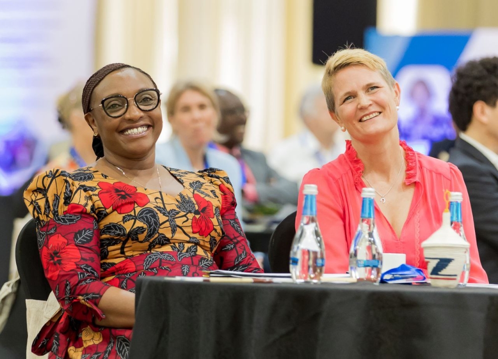 Minister of Education Valentine Uwamariya and Ambassador of Sweden to Rwanda, Johanna Teague share a moment during the ceremony. Courtesy