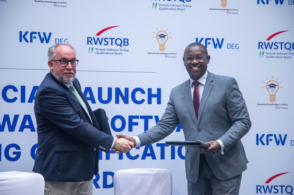 Stephen Goericke, CEO of iSQI GmbH (left) and President of the RWSTQB, Robert Ford (right) during the signing ceremony on March 22. All Photos by Dan Gatsinzi