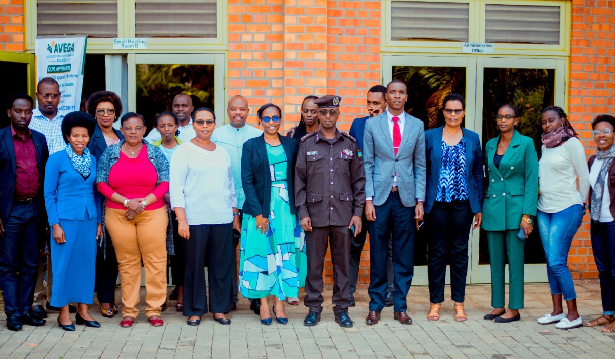 Participants in  a policy dialogue organised by the Association of Genocide Widows Agahozo (AVEGA) pose for a photo after a session in Kigali on March 22. Courtesy