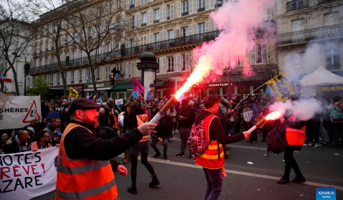 People participate in a protest against a pension reform bill in Paris, France, on March 23, 2023. Net photo