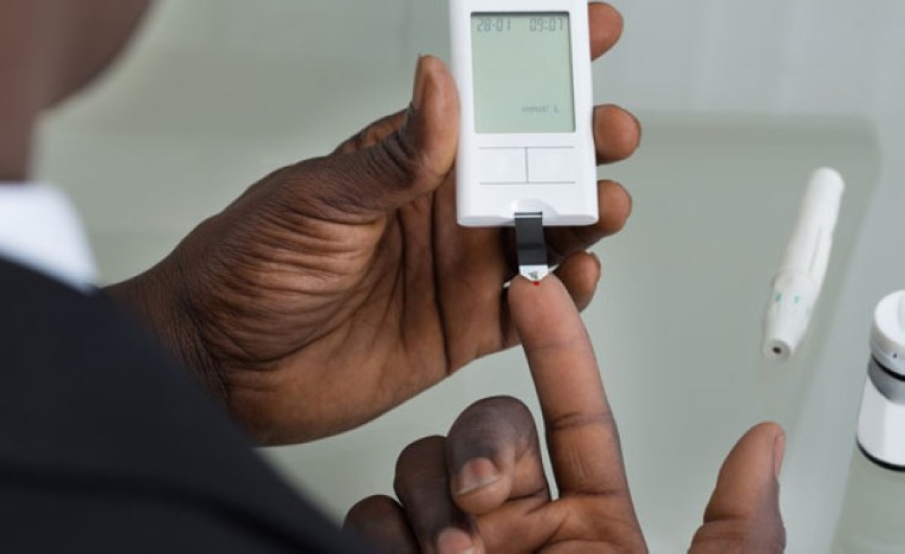 A person during the check-up of low blood sugar levels in Kigali. Courtesy