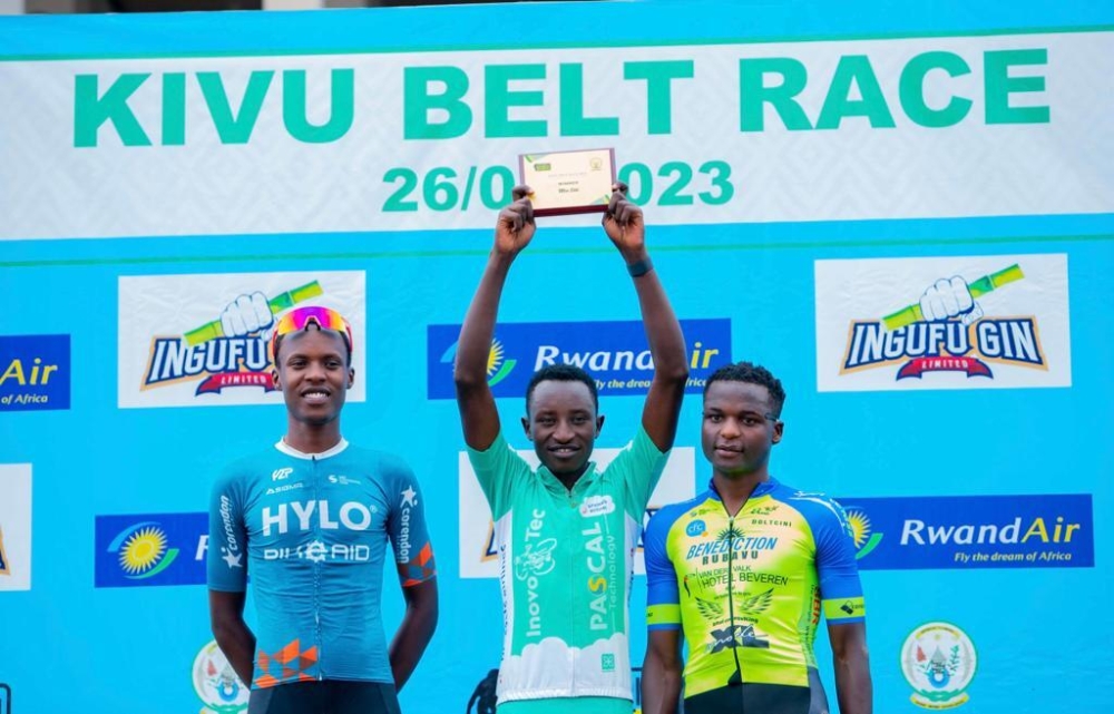 Kivu Belt race winner Samuel Niyonkuru (C) looking excited after beating Bike Aids&#039; Eric Muhoza (L) and Benediction&#039;s Etienne Tuyizere (R) to the race-courtesy.