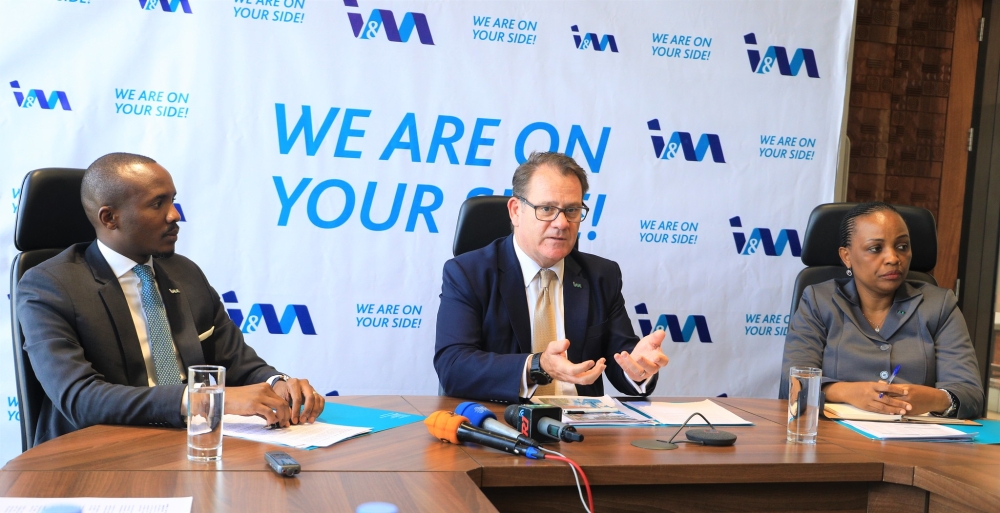 (L-R)Company Secretary Iddy Rugamba,  Robin Bairstow, the CEO of I&M Bank,  Dederi Wimana, Chief Finance Officer, I&M Bank during a press conference on Thursday, March 30. Craish Bahizi