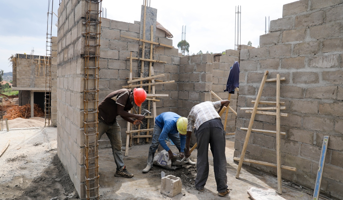 Workers at a construction site in Kigali. Craish Bahizi
