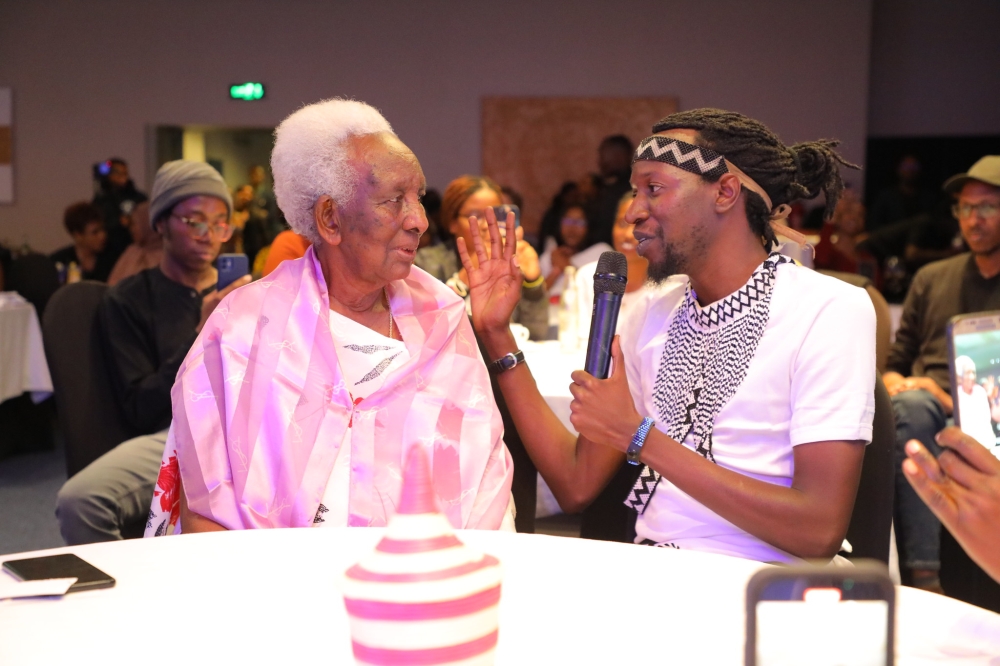 Rwandan traditional music singer Ruti Joel  during the ‘Intore Cyane’ concert at Hôtel des Mille Collines  on Saturday, April 1. Photos by Craish Bahizi