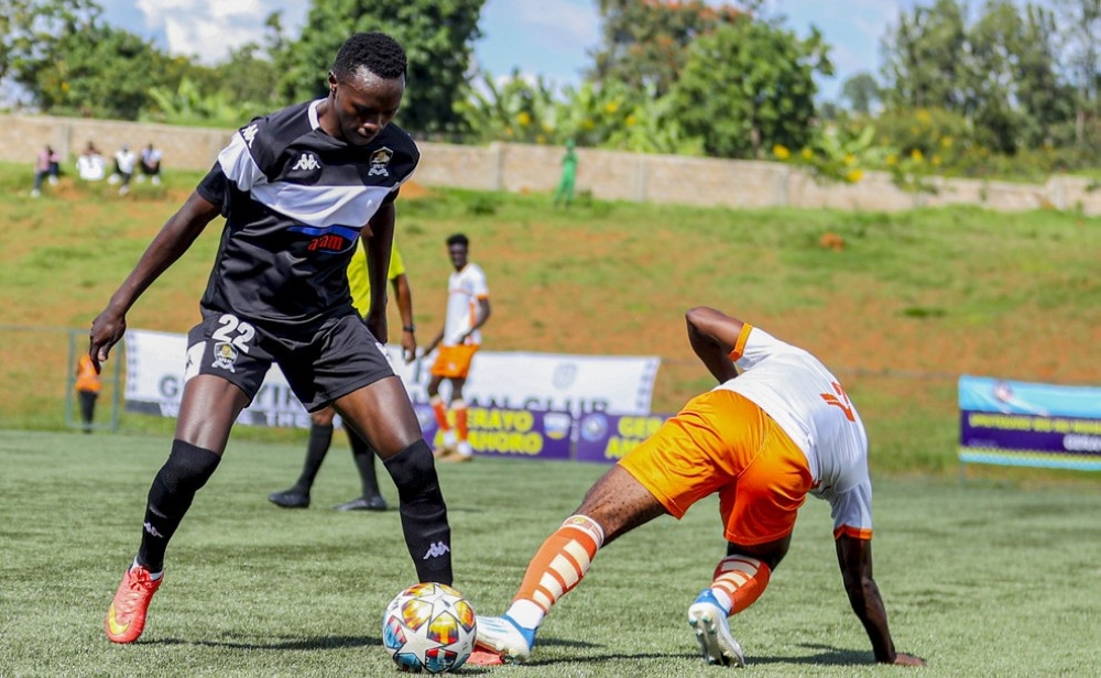 APR FC&#039;s Yannick Bizimana wins the ball against Bugesera FC during the 2-1 game at Bugesera Stadium on Sunday, April 2. Igihe