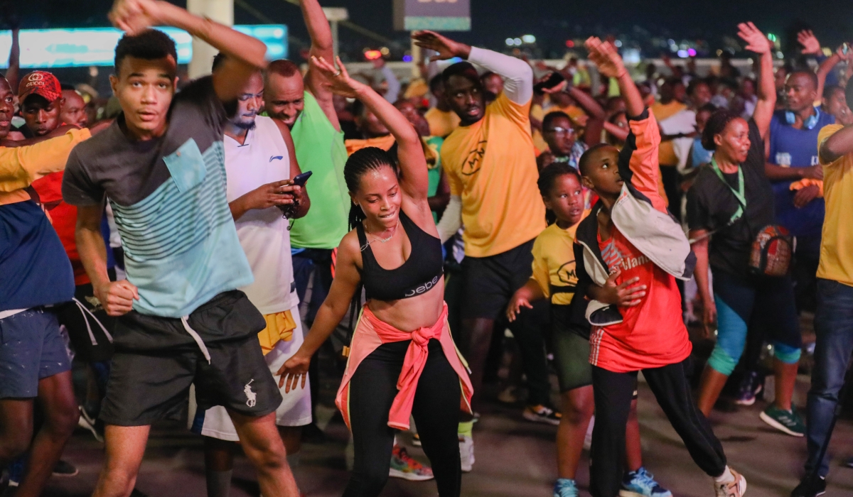 Kigali residents stretching their bodies  during Kigali Night Run in June 2022. Rwanda has emerged first in Africa and the 42nd in the world in non-discrimination index. Craish Bahizi