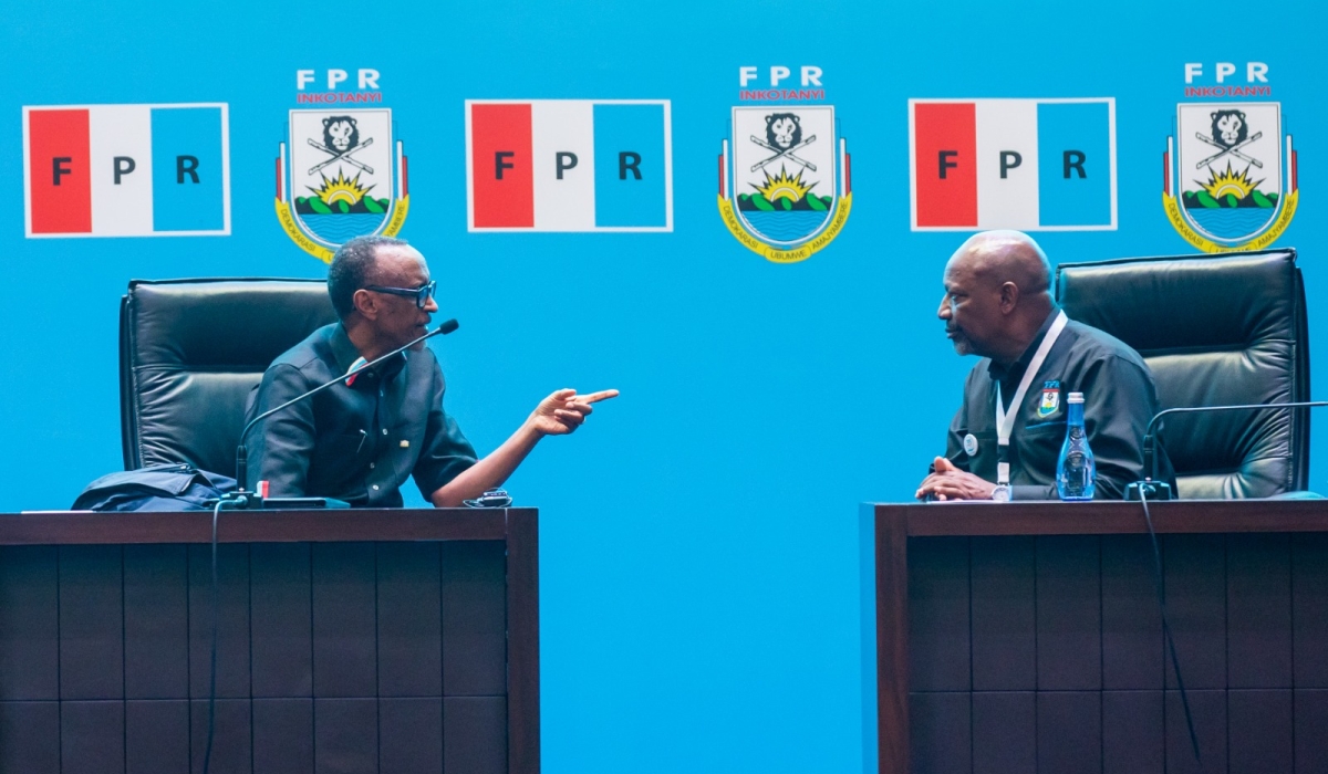 President Paul Kagame, who was re-elected as RPF-Inkotanyi Chairman, chats with Wellars Gasamagera (R), the ruling party&#039;s new Secretary General, during the 16th RPF Congress in Kigali on Sunday, April 2. Olivier Mugwiza