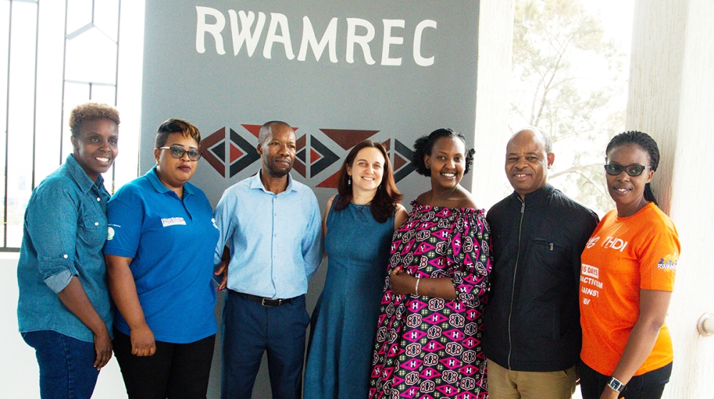 Officials from RWAMREC in a group photo. RWAMREC chairperson Venant Nzabonimpa pointed out that a man’s role in Rwandan society was previously confined to putting food on the table but he stressed paternity leave is needed.