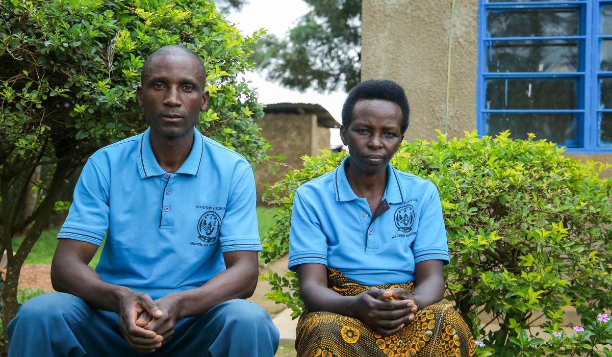 Andre Ahishakiye, a &#039;Binome&#039; community health worker, (right) and Vestine Mukashema, who works as an ASM speak to a journalist at home. Photo by Dan Gatsinzi