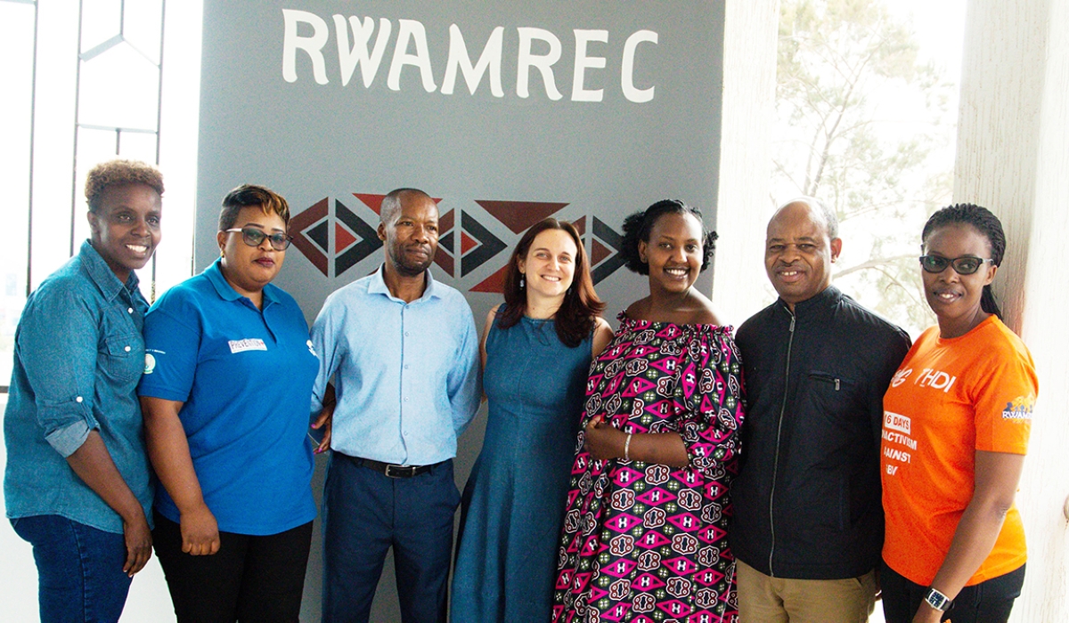 Officials from RWAMREC in a group photo. RWAMREC chairperson Venant Nzabonimpa pointed out that a man’s role in Rwandan society was previously confined to putting food on the table but he stressed paternity leave is needed.