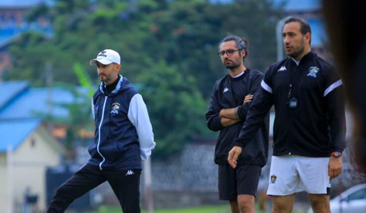 APR head coach Ben Moussa (left) with his assistants during a training session. Courtesy