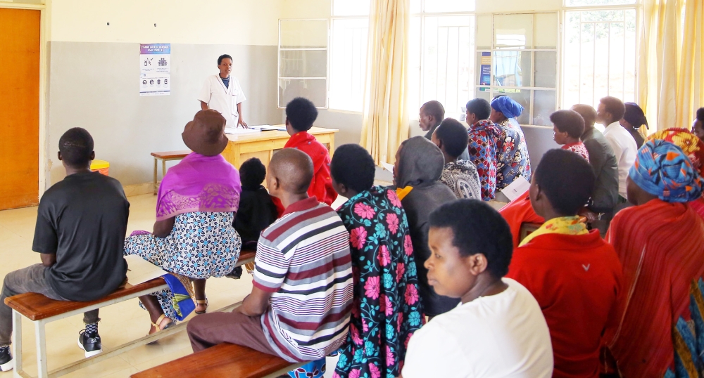 Couples during an antenatal visit at Ngeruka Health Centre in Bugesera District. Women are also taught how to prepare a balanced diet with the
available resources. Photos: Dan Gatsinzi.