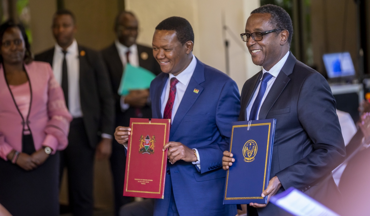 Ministers of Foreign Affairs, Dr Vincent Biruta and his counterpart Alfred Mutua at the signing of the agreement in Kigali, on Tuesday, April 4. Photo by Olivier Mugwiza