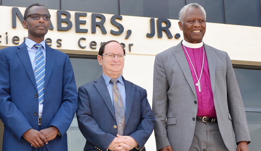 (L-R) Dr. Papias Musafiri Malimba, the newly appointed Deputy Principal Academic Affairs and Research; Ron Adam, the Ambassador of Israel to Rwanda; and Archbishop Laurent Mbanda pose for a photo. Courtesy
